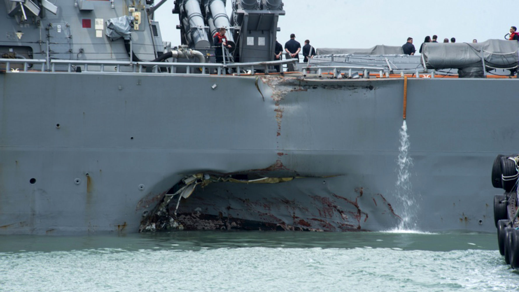 Image result for Stricken U.S. destroyer arrives in Singapore after collision, 10 sailors missing