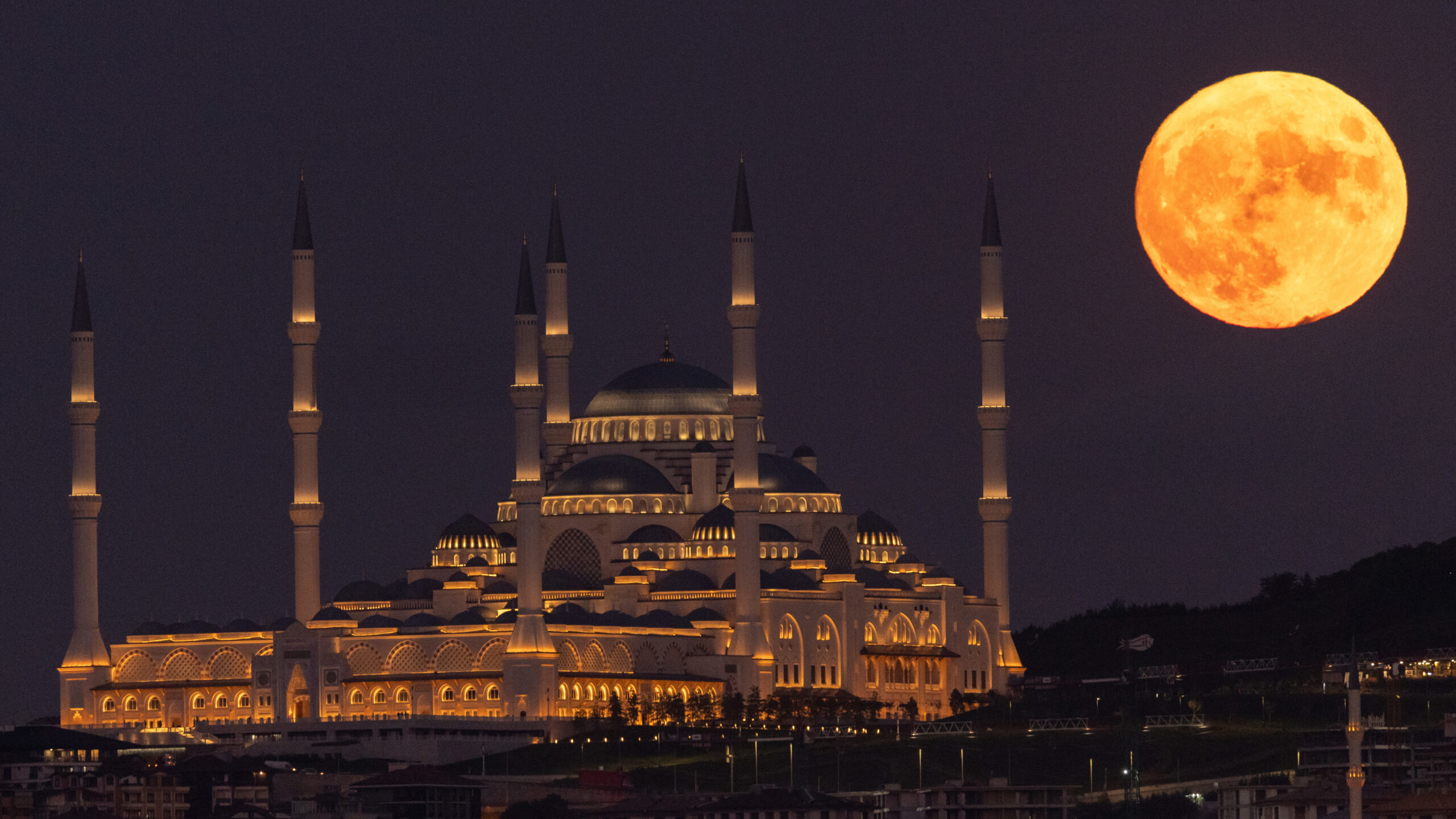 The last supermoon of the year lights up the night sky all over the ...
