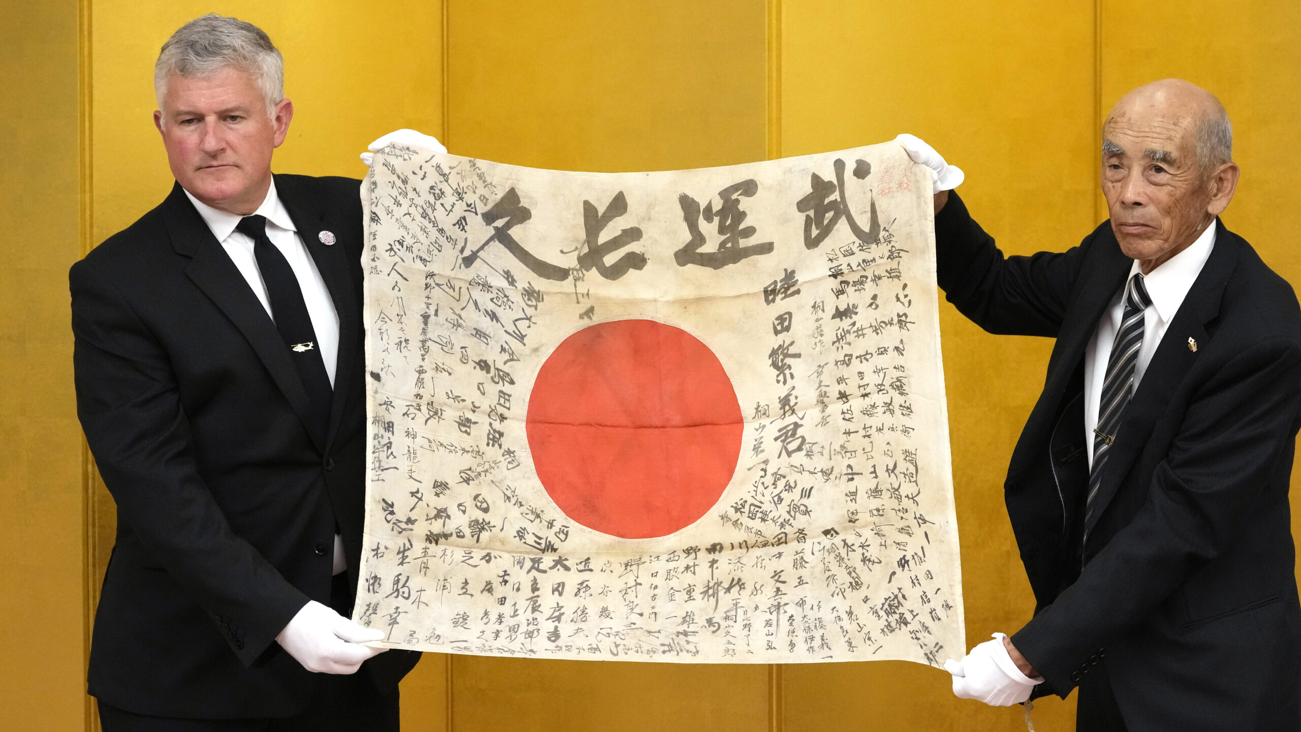 A WWII Japanese soldier's 'good luck flag' is returned to his