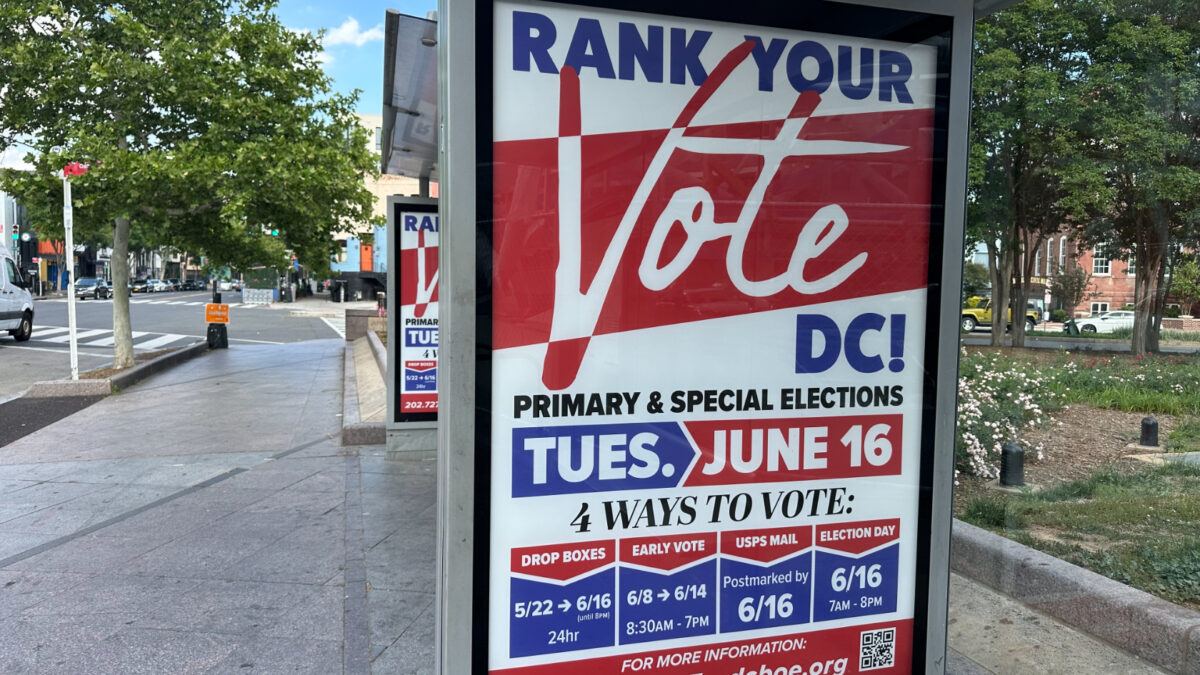 A sign advertises ranked choice voting at a bus stop in Northwest D.C.